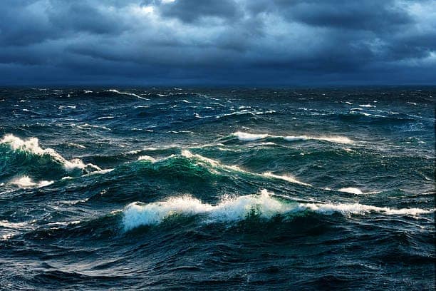 breaking waves at rising storm